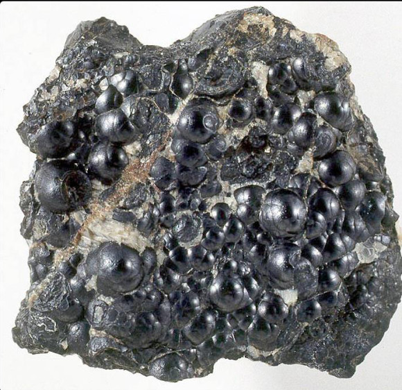 ‘Pitchblende’ Uraninite, 6 cm across, from Jachymov (photo © Jeff Weissman/mindat.org)
