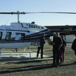 The Crew loading into the helicopter in search of Arizona treasures