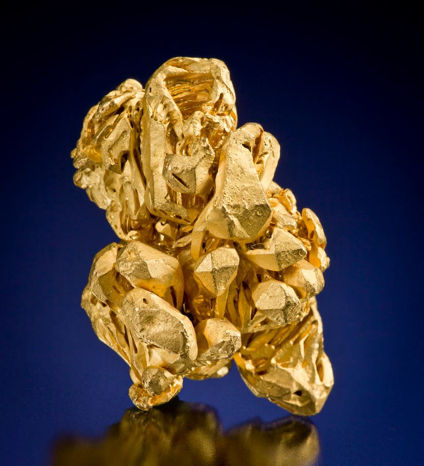 buttery gold crystals with sharp crystal form. Very Rare to see high quality terminated gold crystals