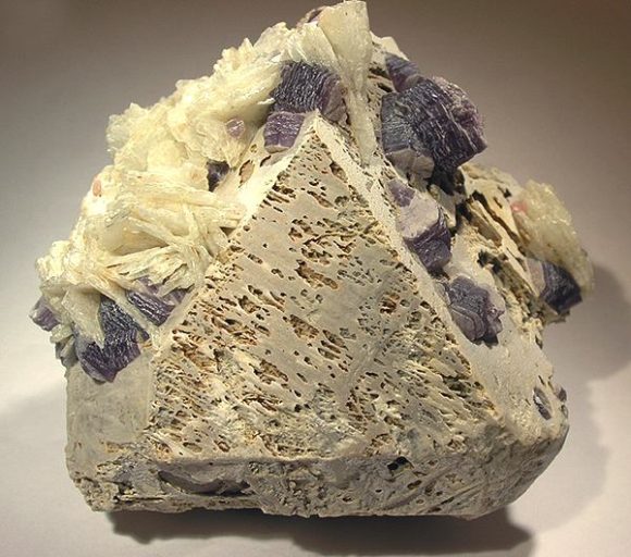 Etched Microcline (twinned) with Albite and Lepidolite - 10.1 cm - photograph from Rob Lavinsky, iRocks.com