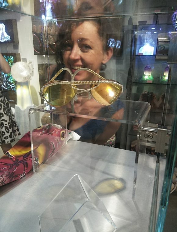 Wire Artist Naomi Hinds with amber lens sunglasses with custom woven wire frames