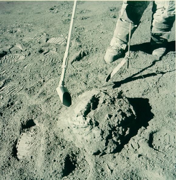 A rock scoop in use by the Apollo astronauts to collect lunar samples!