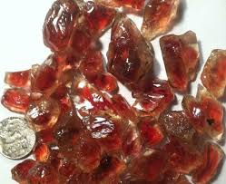 An amazing, rare watermelon sunstone, top quality rough, and some premium facets from the Spectrum Sunstone Mine